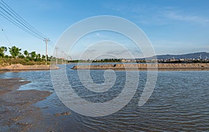 Aquaculture farms and saline alkali land by the sea under the blue sky