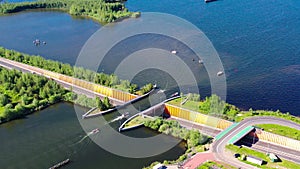 Aquaduct Veluwemeer, Nederland. Aerial view from the drone. A sailboat sails through the aqueduct on the lake above the