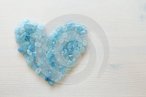 Aquamarine is blue. Blue heart. Natural stone is blue aquamarine