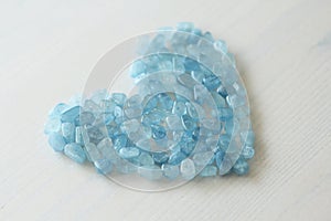 Aquamarine is blue. Blue heart. Natural stone is blue aquamarine