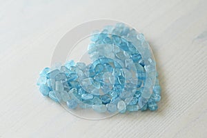 Aquamarine is blue. Blue heart. Natural stone is blue aquamarine