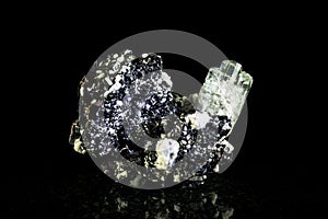 Aquamarine crystal and schorl, black background