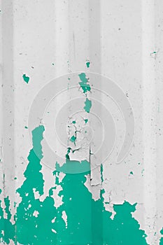 Aquamarine green peeling old paint metal surface fence texture background white flakes