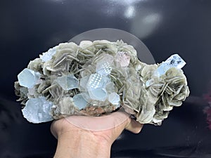 Aquamarine with pink flourite on muscovite mica matrix mineral specimen from Nagar Pakistan