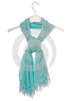 Aquamarine scarf is on hanger