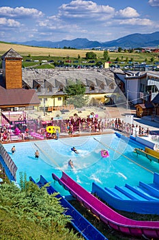 Aquapark with colorful water slides color tubes and pipes in water park Tatralandia in Slovakia