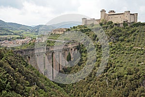 Aqueduct and castle, Italy photo