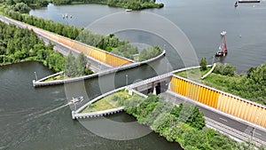 Aqueduct Veluwemeer near Harderwijk transport asphalt motorway road for traffic crossing underneath a waterway river