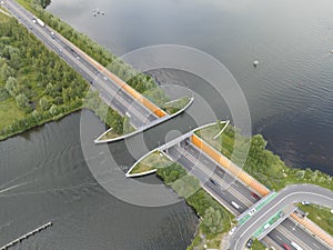 Aqueduct Veluwemeer near Harderwijk transport asphalt motorway road for traffic crossing underneath a waterway river