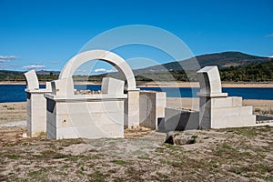 Roman ruins with lake. Aquis Querquennis archaeological site, arched stone door. BaÃÂ±os de Bande, Orense, Spain photo