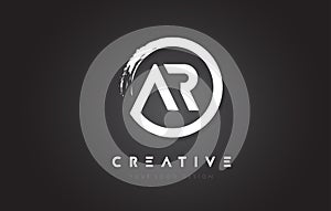 AR Circular Letter Logo with Circle Brush Design and Black Background. photo
