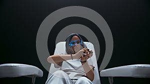 AR glasses girl monitoring digital screen closeup. Person enjoying video game