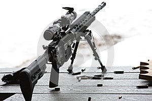 AR-15 rifle with bipod and scope photo