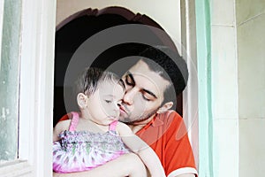 Arab baby girl with father