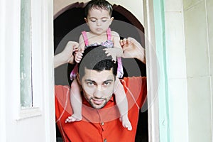 Arab baby girl with father