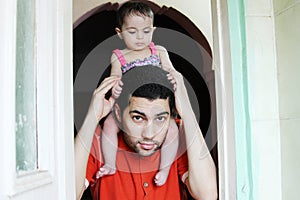 Arab baby girl with father