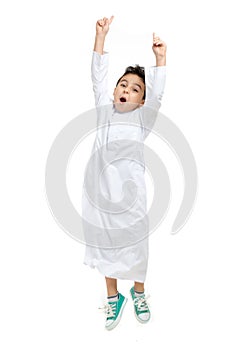 Arab boy jumping high with a big and cheering pose