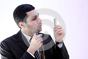 Arab business man praying for help