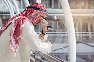 Arab Businessman is disappointed from losing in stock exchange,