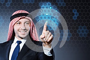 The arab businessman pressing virtual buttons