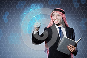 The arab businessman pressing virtual buttons