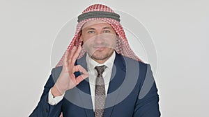 Arab Businessman showing Ok Sign with Finger, White Background