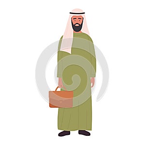 Arab businessman in traditional Muslim outfit holding briefcase and standing