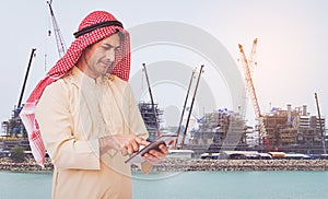 Arab businessman useing on a mobile phone