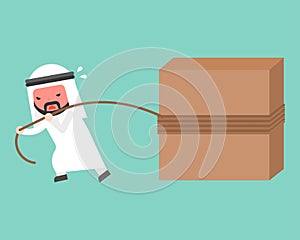 Arab Businessman work hard, pulling block with rope