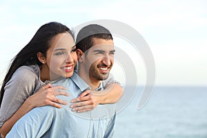 Arab couple flirting in love on the beach