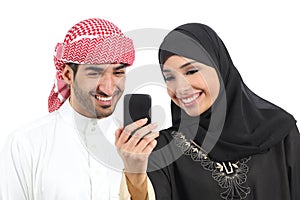 Arab couple sharing social media on the smart phone