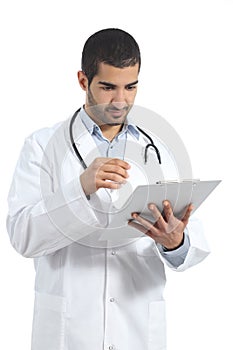 Arab doctor man reading a medical history