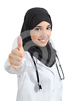 Arab doctor woman agree with thumb up photo