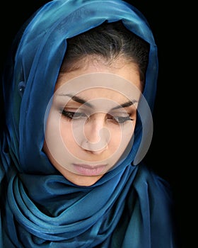 Arab girl in blue scarf