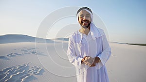 Arab guy advertising agent looking at camera tells information a