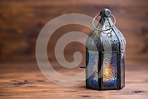 Arab lamp on wooden background, concept Ramadan Kareem