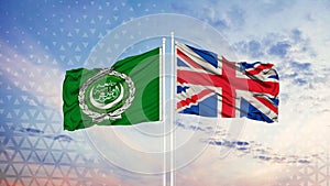 Arab League and Britain flag waving in the wind against white cloudy blue sky together. Diplomacy concept, international relations