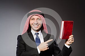 Arab man with book