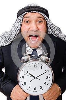 Arab man with clock isolated on white