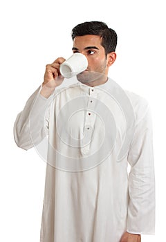Arab man drinking coffee photo