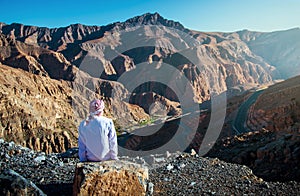 Arab man at the Jebel Jais desert mountain in Ras al Khaimah UAE