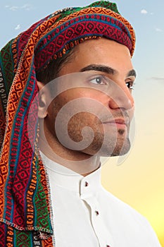 Arab man looks out expectantly photo