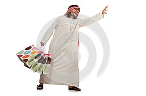 The arab man with shopping bags on white