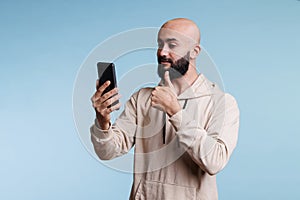 Arab man showing thumb up at video call