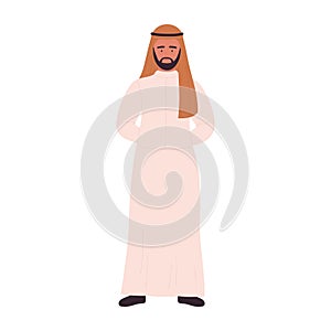 Arab man in traditional Muslim clothing standing in confident pose