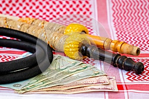 Arab Money Dirham Bank note, , hookah and Traditional Arab Male Clothes - kaffiyah and agal photo