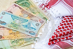 Arab Money Dirham Bank notes  and Traditional Arab Male Scarf - kaffiyah photo