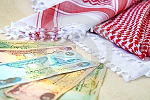 Arab Money Dirham Bank notes  and Traditional Arab Male Scarf - kaffiyah photo