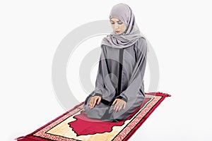 Arab muslim woman praying