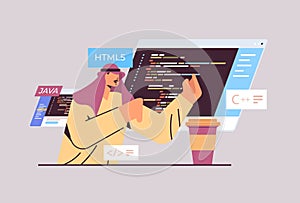 arab programmer writing code for computer app engineering software coding programming